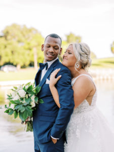 Bride and groom portrait at a Channel Side Wedding in Palm Coast, Florida. Taken by Ashley Dye Photography, a Jacksonville, Florida Wedding Photographer.