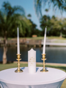 Candle wedding decor for ceremony at a Channel Side Wedding in Palm Coast, Florida. Taken by Ashley Dye Photography, a Jacksonville, Florida Wedding Photographer.