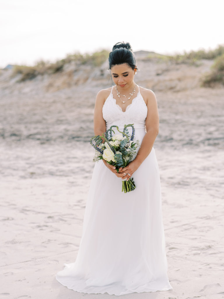 Bride in lace dress from Lulus.  St Augustine Beach Elopement Photograph Taken By Ashley Dye Photography A St Augustine, Florida Wedding Photographer.