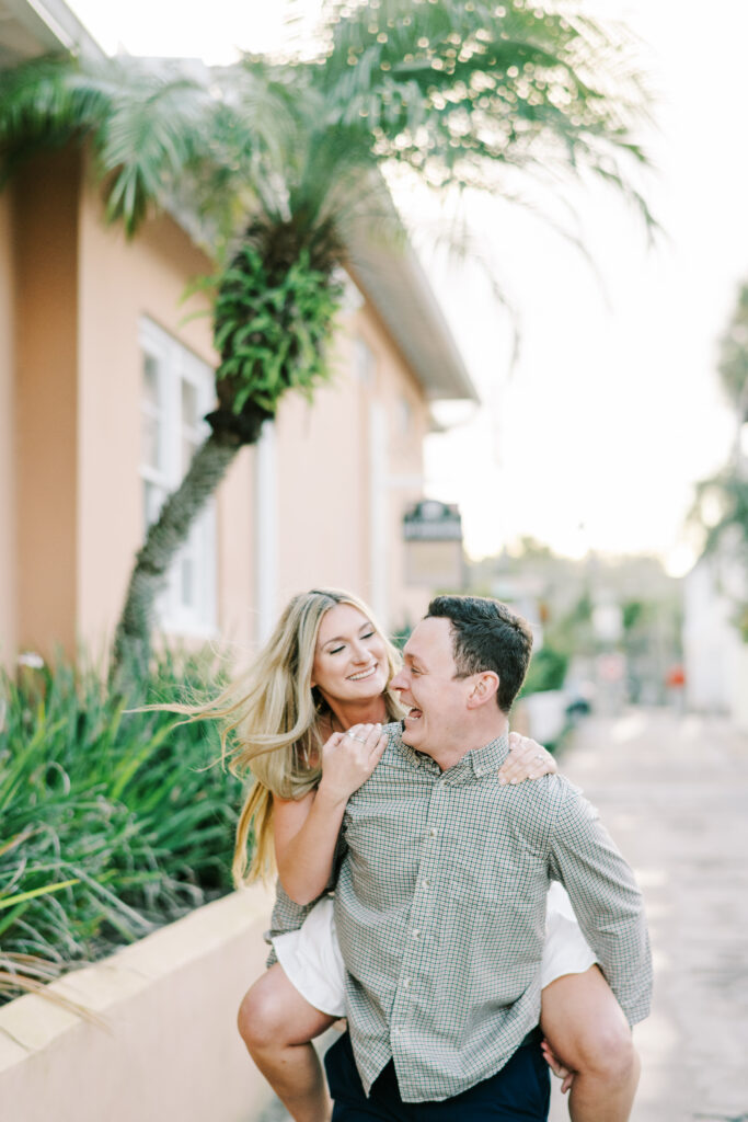 Trendy St Augustine Engagement Session Callie and Joshua Piggy Back Ride